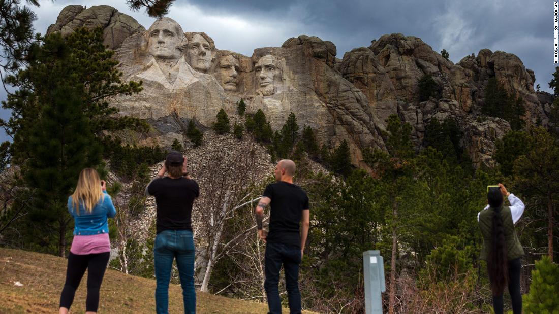 KEYSTONE, SOUTH DAKOTA - JULY 01: Tourists visit Mount Rushmore National Monument on July 01, 2020 in Keystone, South Dakota. President Donald Trump is expected to visit the monument and  make remarks before the start of a fireworks display on July 3. (Photo by Scott Olson/Getty Images)